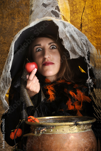 witch giving a poisened apple photo