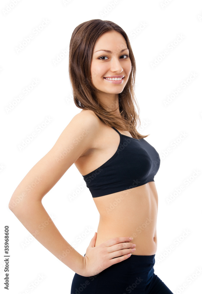 Smiling woman in fitness wear, isolated Smiling woman in fitness wear, isolated
