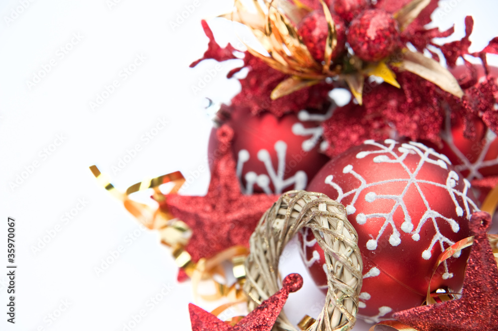 Red theme Christmas decorations against white background