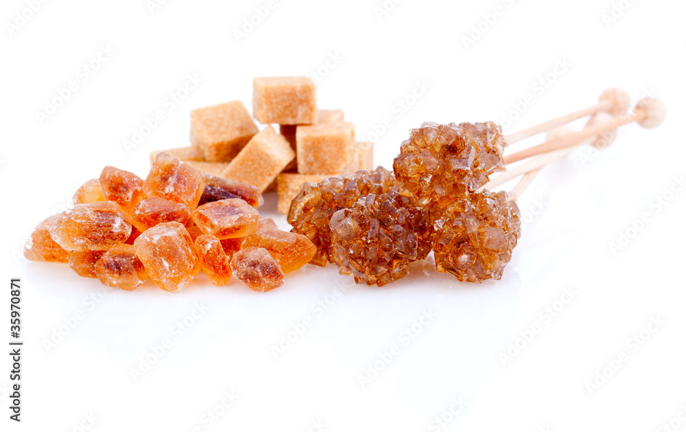 Brown sugar, isolated on white Brown sugar, isolated on white