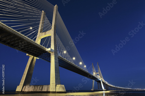 Fototapeta Naklejka Na Ścianę i Meble -  Vasco da Gama bridge in Lisbon by night, Portugal
