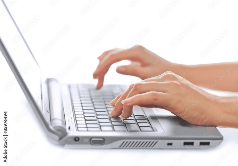 Close-up of typing female hands, selective focus Close-up of typing female hands, selective focus