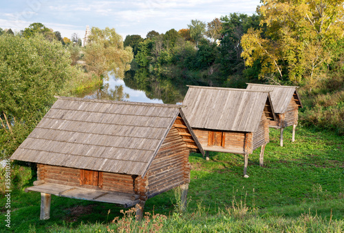 Tableau sur toile Barns on stilts, the Museum of Wooden Masterpieces in the ancien