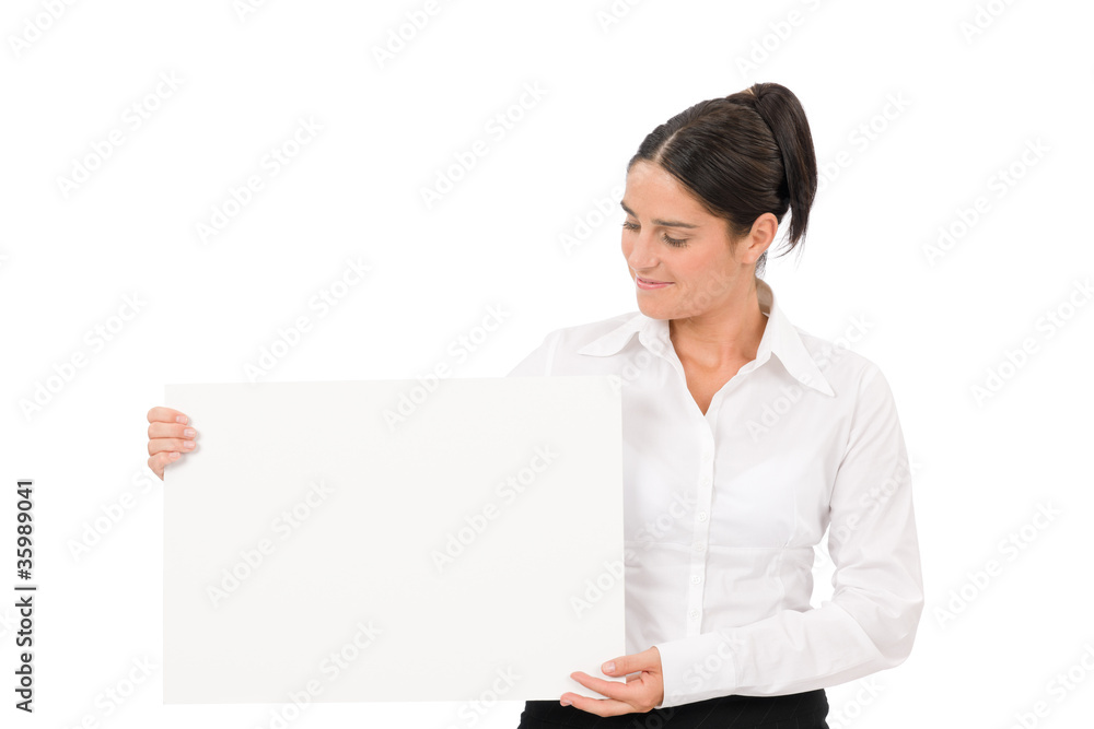 Happy businesswoman looking aside empty banner Happy businesswoman looking aside empty banner