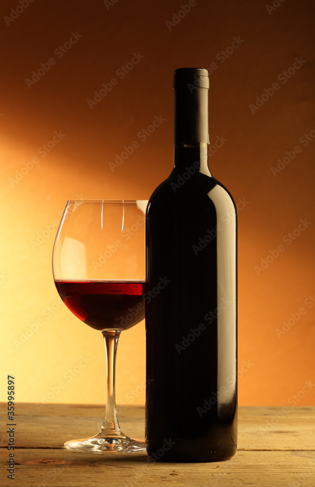 Bottle and glass of red wine Bottle and glass of red wine