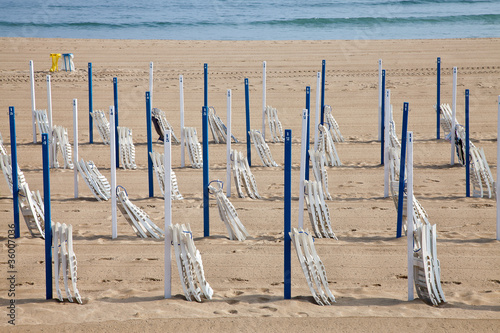 Sillas en la playa de Zurriola, San Sebastián photo