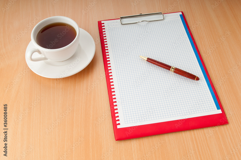 Binder with blank page and tea Binder with blank page and tea
