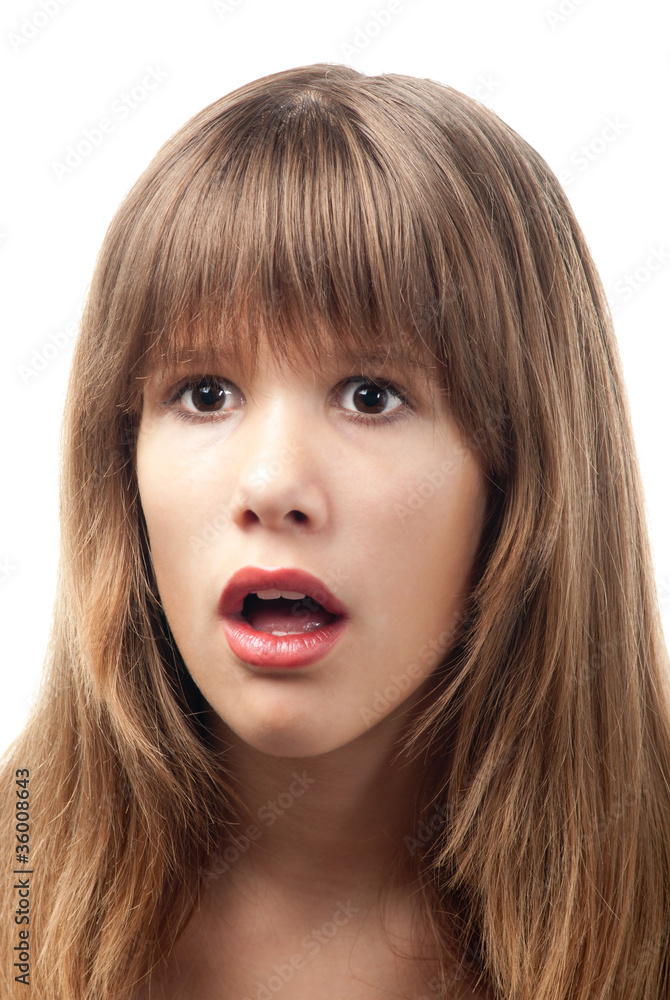 Portrait of the beautiful teenage girl with surprised look Portrait of the beautiful teenage girl with surprised look