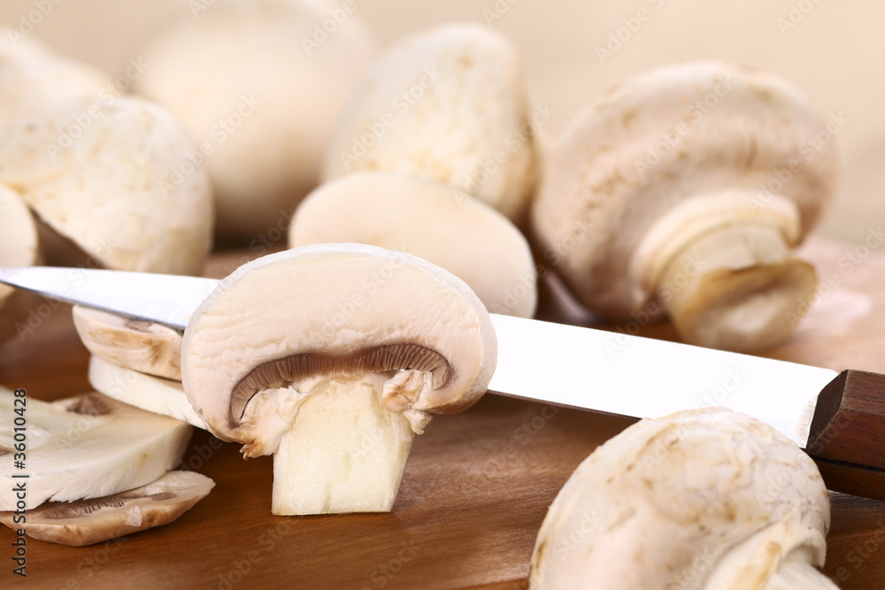 White mushroom complete and sliced White mushroom complete and sliced
