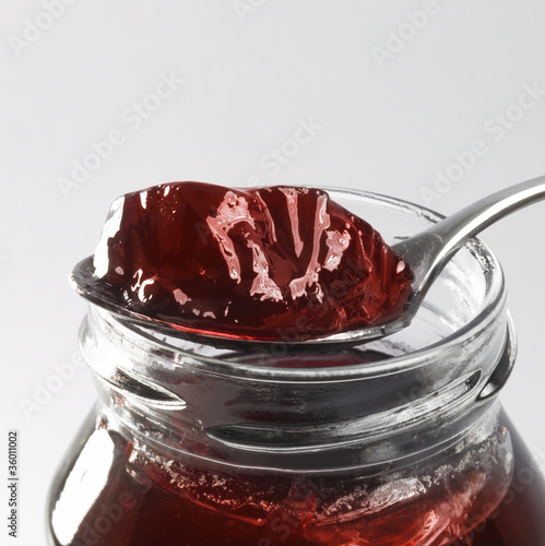 jelly with glass and spoon photo