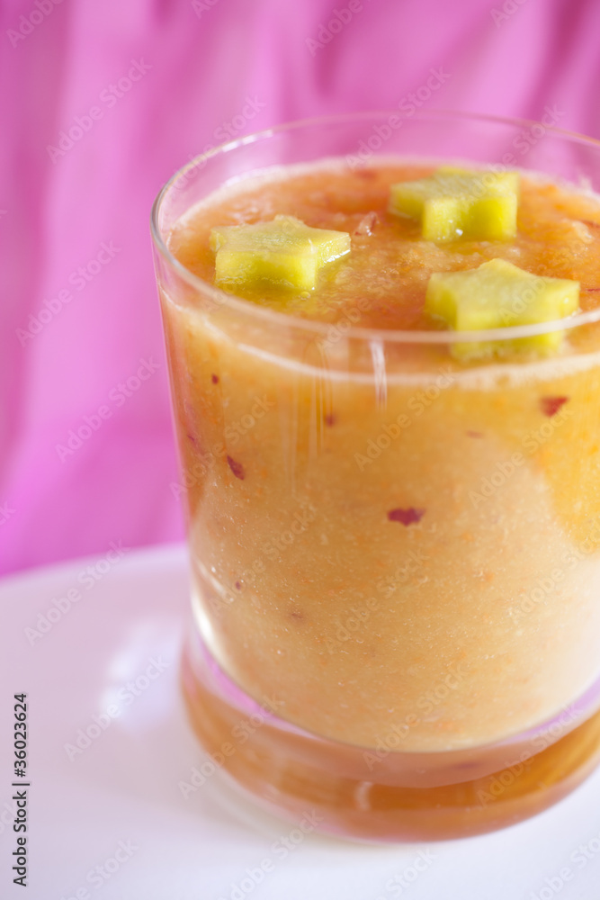 glass with blended fruits decorated with the stars glass with blended fruits decorated with the stars
