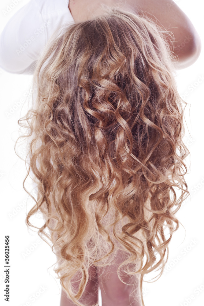 Naklejka premium Blond curl hair of young woman