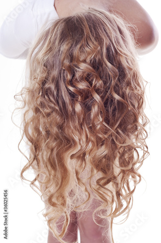 Blond curl hair of young woman