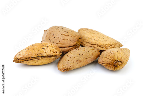 Five unshelled almonds