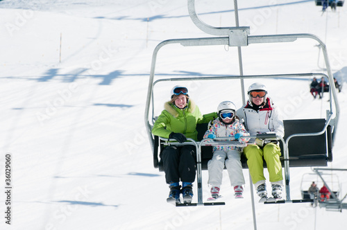 Ski lift -  skiers on ski  vacation
