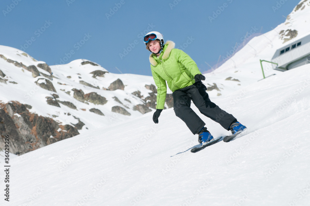 Skiing - young skier on ski slope Skiing - young skier on ski slope