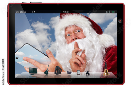 Santa Claus on the tablet-pc photo