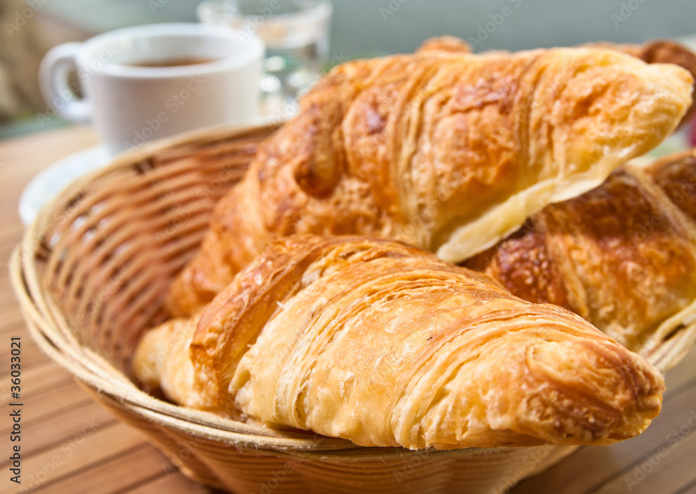 Breakfast with coffee and croissants Breakfast with coffee and croissants