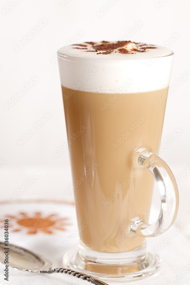 coffee latte with frothy milk in tall glass coffee latte with frothy milk in tall glass