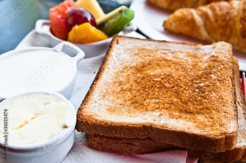 Breakfast with orange juice and fresh fruits