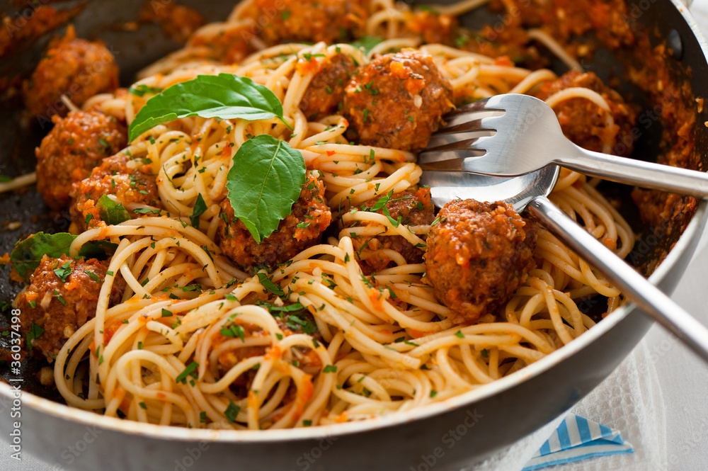 Original Italian spaghetti with meatballs in tomato sauce