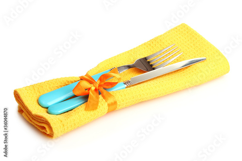 cutlery and napkin isolated on white