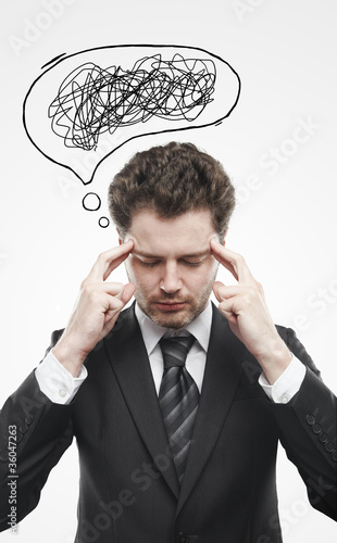 Businessman with confusing tangle of thoughts. Thinking man