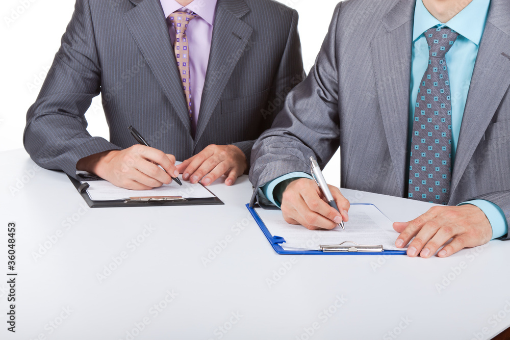 Two business people working with documents sign up contract Two business people working with documents sign up contract