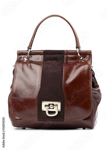 Brown female handbag over white