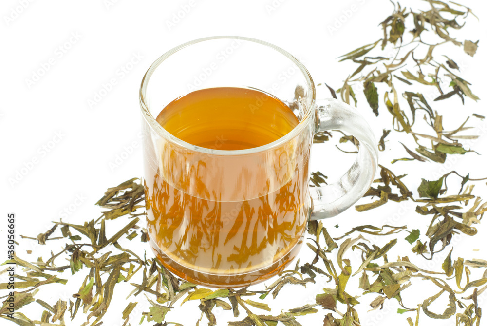 tea in glass cup and dried leaves tea in glass cup and dried leaves