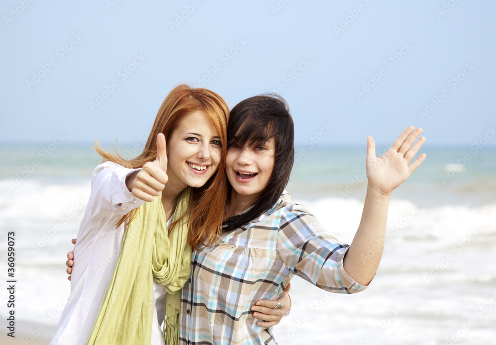 Two girls at outdoor near sea Two girls at outdoor near sea