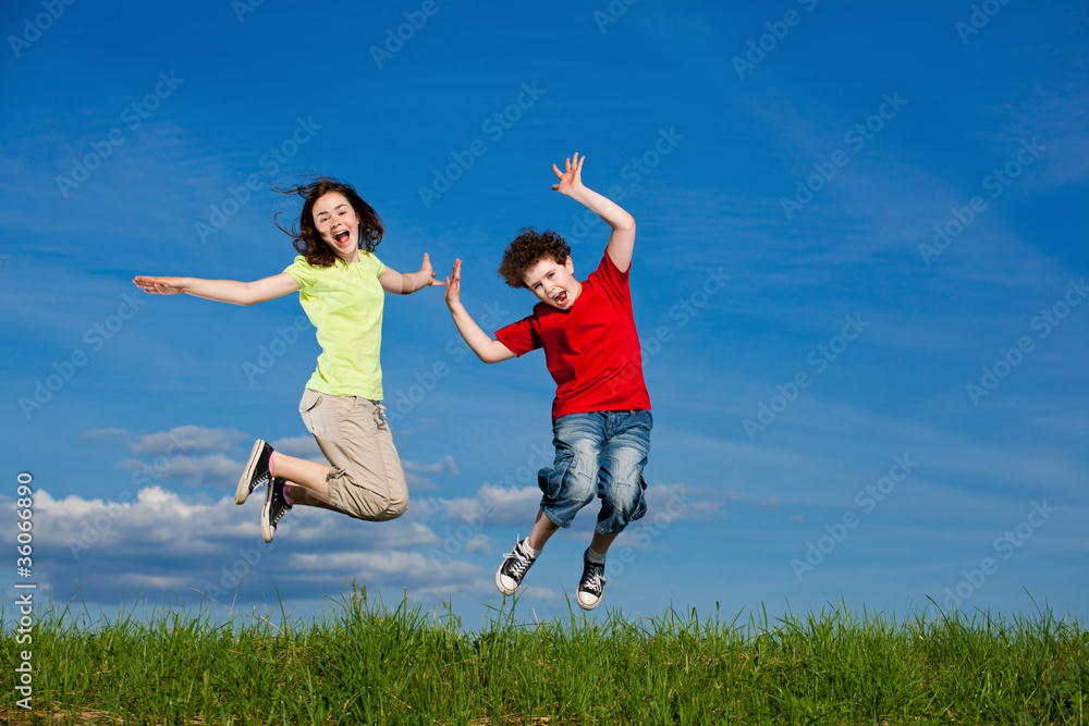 Girl and boy running, jumping outdoor Girl and boy running, jumping outdoor