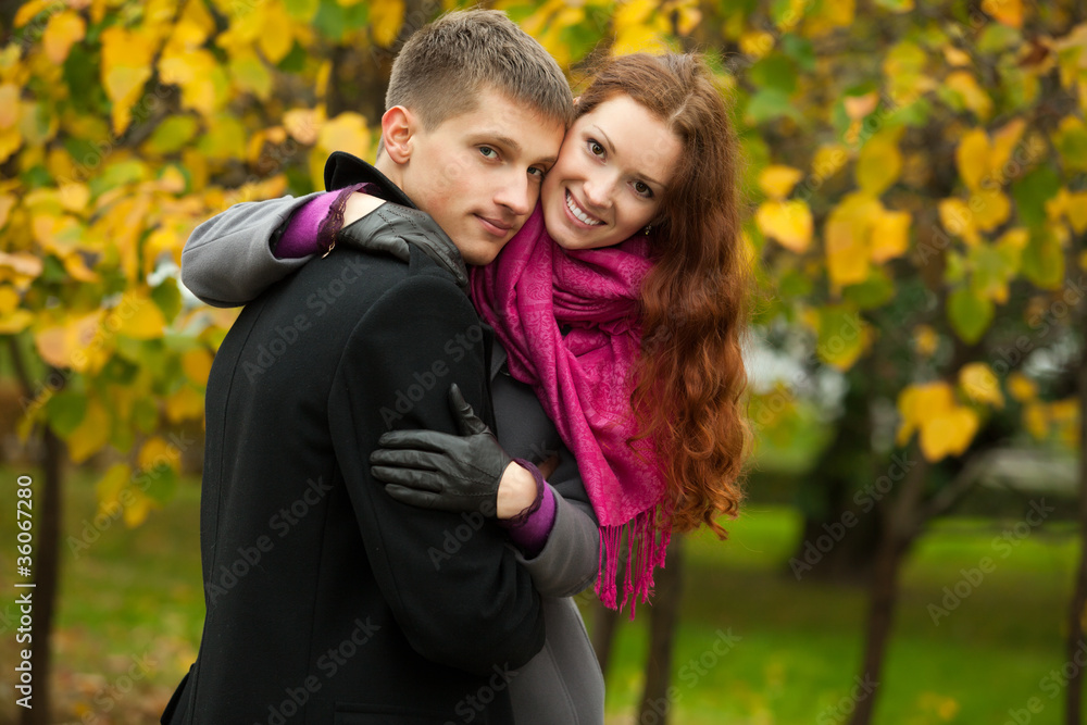 young happy couple in the park young happy couple in the park