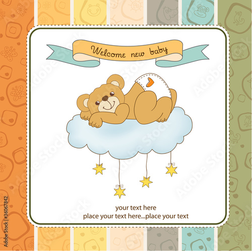 New baby shower card with spoiled teddy bear