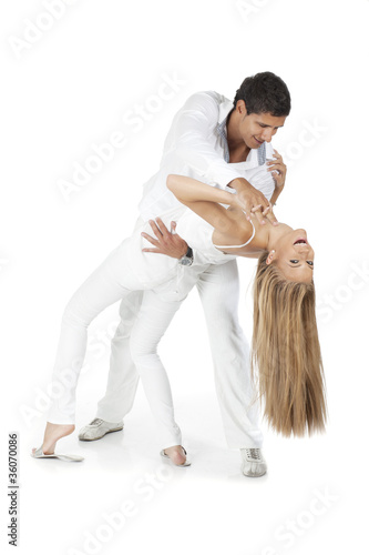 Young couple dancing and have fun