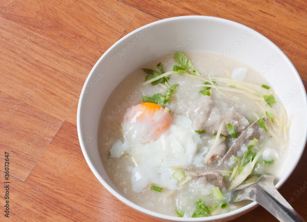 Thai style breakfast with pork and soft-boiled egg