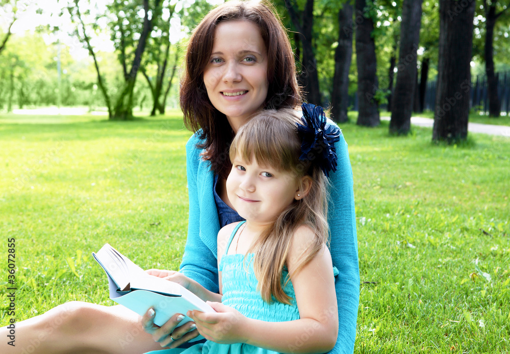 Portrait of mother and daughter in the park Portrait of mother and daughter in the park