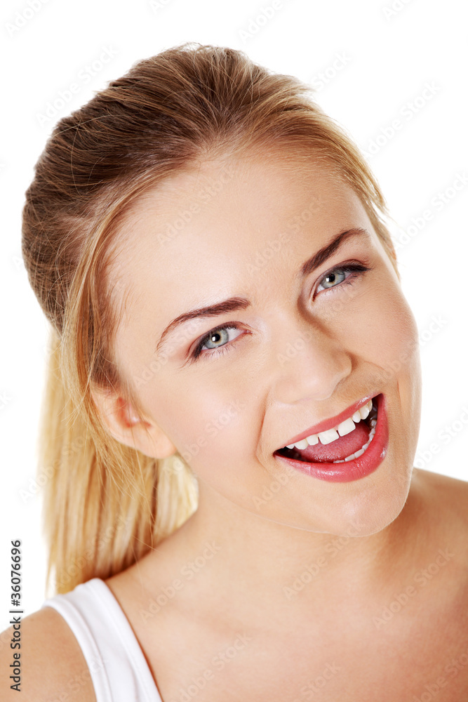 Blonde girl smiling with open mouth. Blonde girl smiling with open mouth.