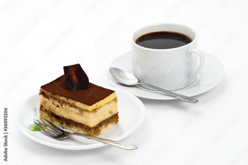 Tiramisu cake on the plate over white background