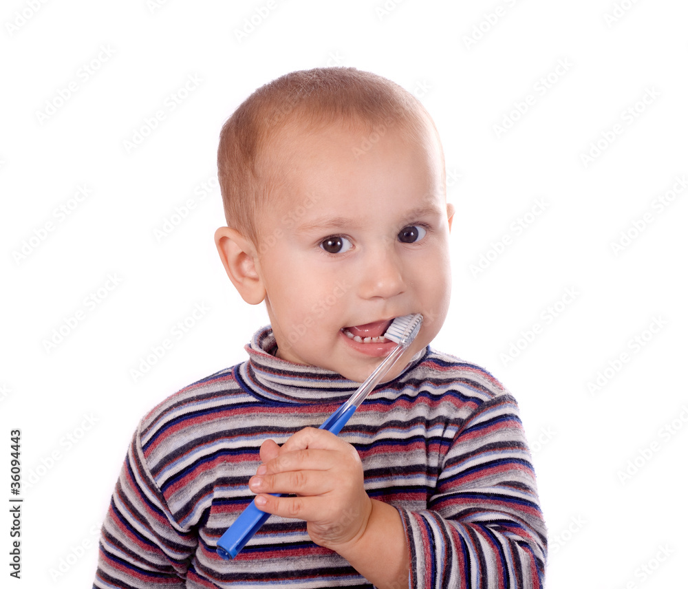 Boy brushing his teeth after bath Boy brushing his teeth after bath