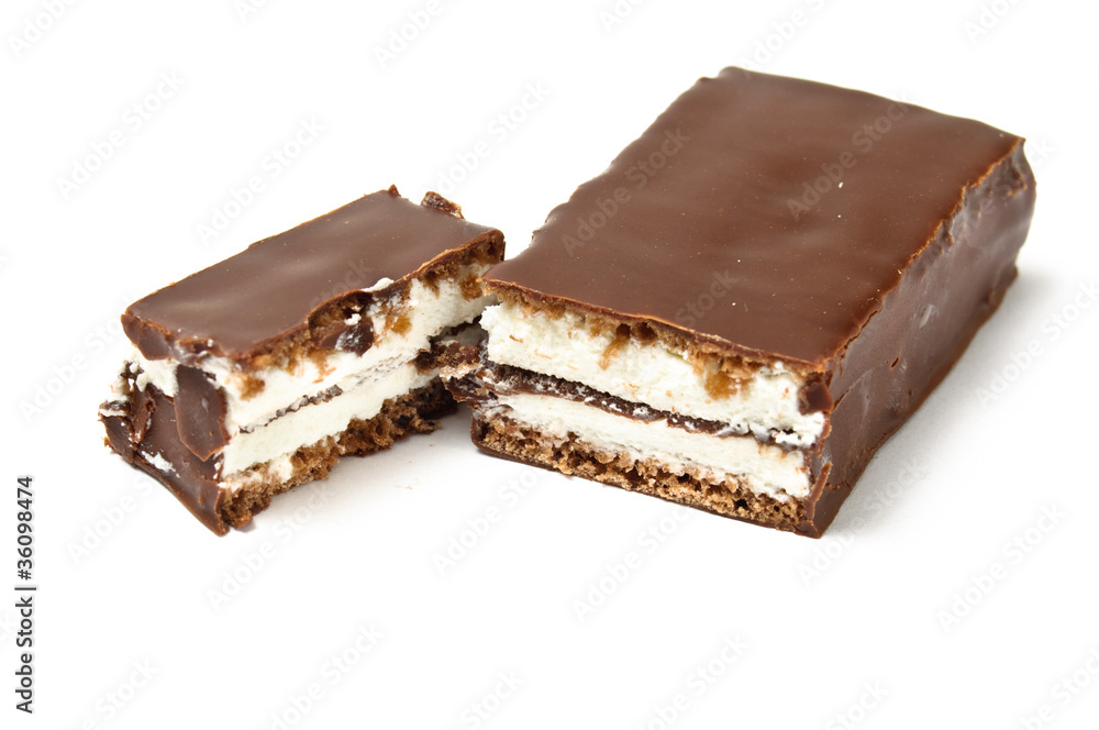 Chocolate bar with skimmings filling cut with second half Chocolate bar with skimmings filling cut with second half