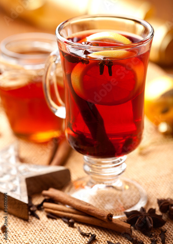 Hot tea with lemon, honey and spices for winter time