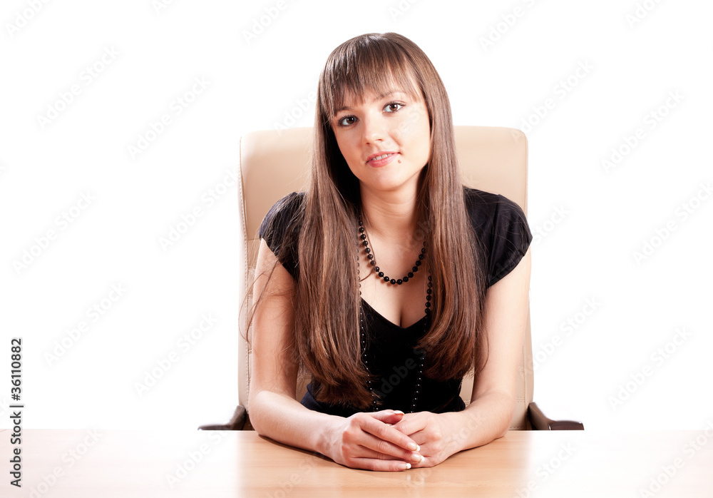 Young woman welcomes at the desk Young woman welcomes at the desk