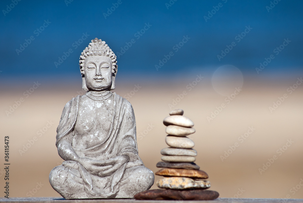 Fototapeta premium Buddha und Steinturm