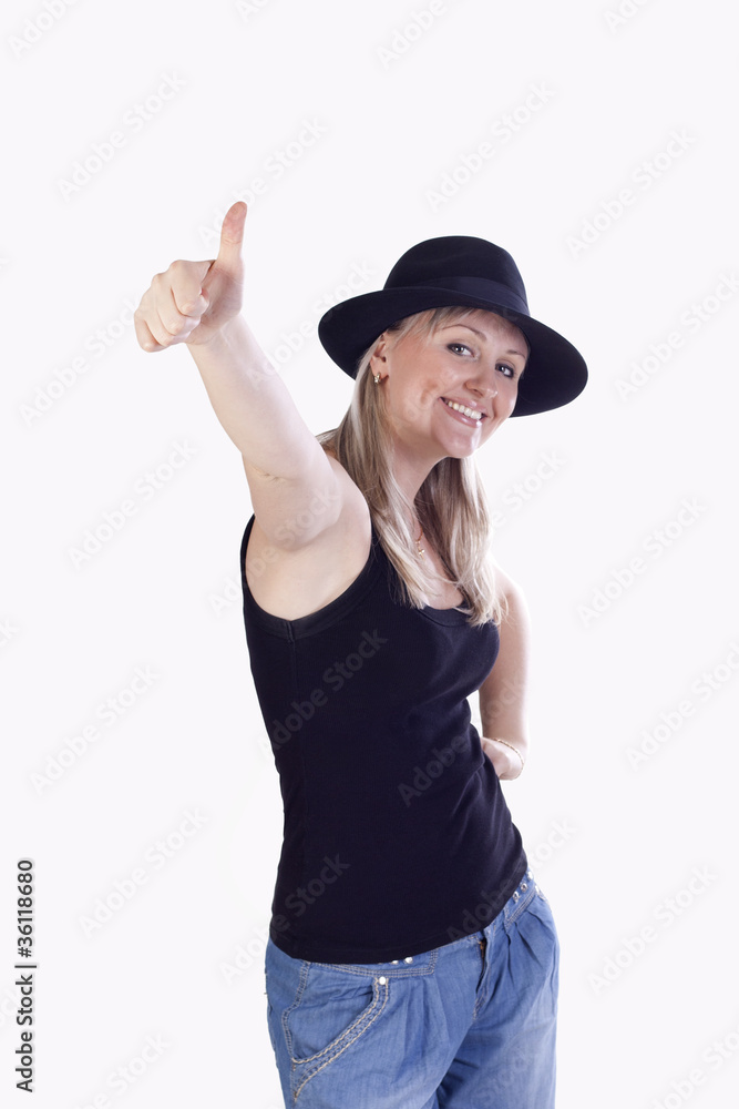 Beautiful young woman in hat showing hand ok sign Beautiful young woman in hat showing hand ok sign