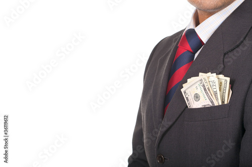 businessman wearing suit with money in the pocket