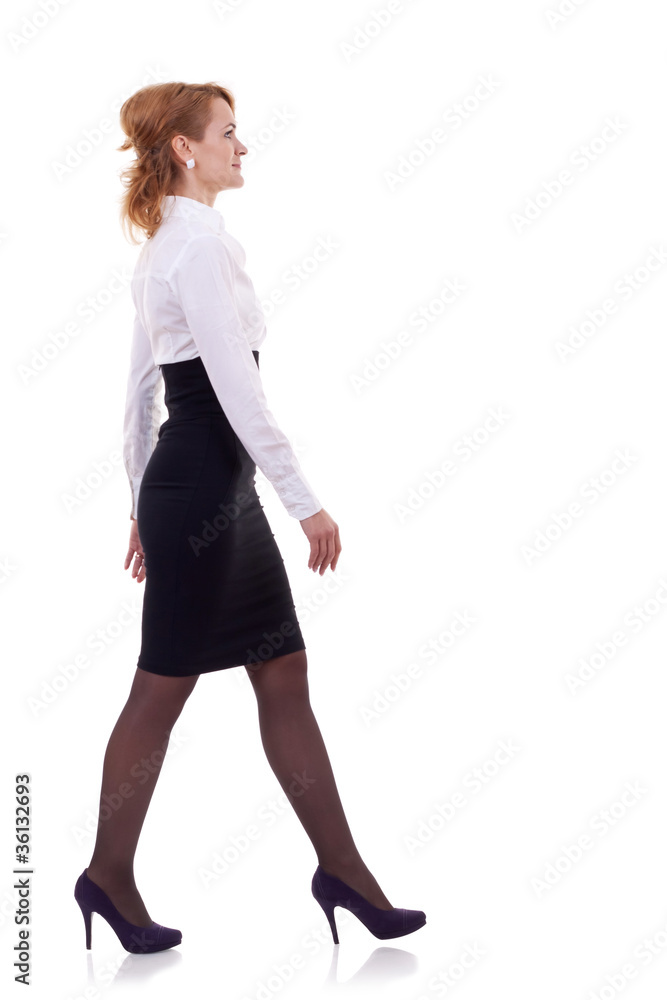 young business woman is walking young business woman is walking