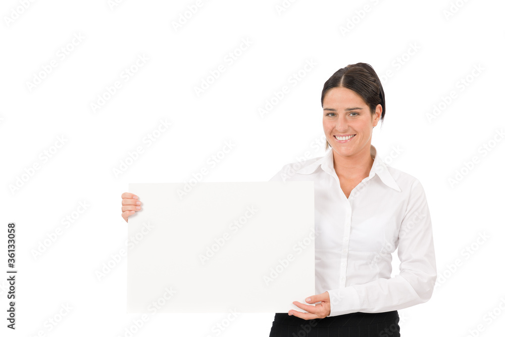 Happy businesswoman holding aside empty banner Happy businesswoman holding aside empty banner