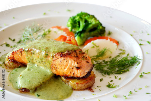 roasted salmon served with green sauce