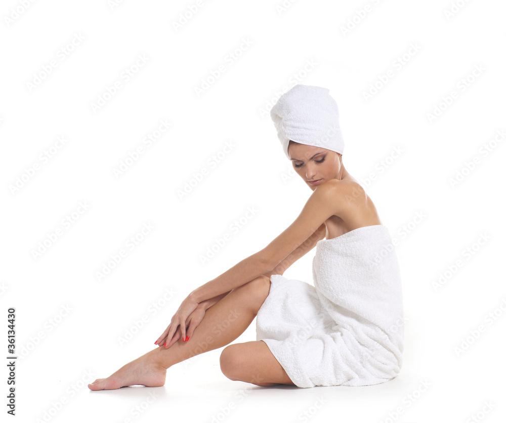 Young attractive woman getting spa treatment isolated on white Young attractive woman getting spa treatment isolated on white